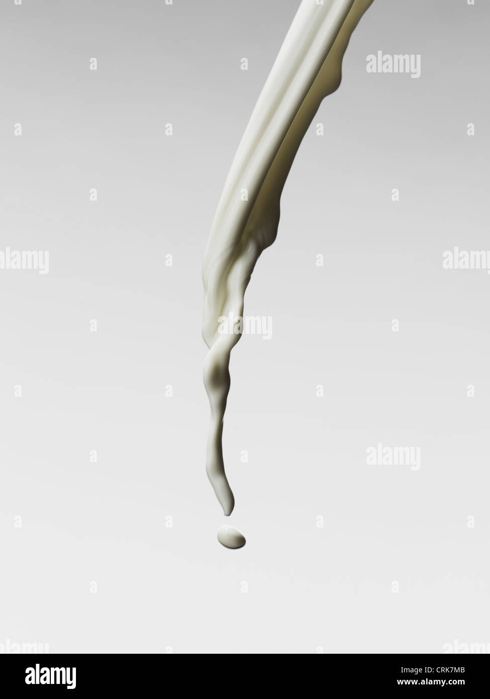 Close up of pouring milk Stock Photo