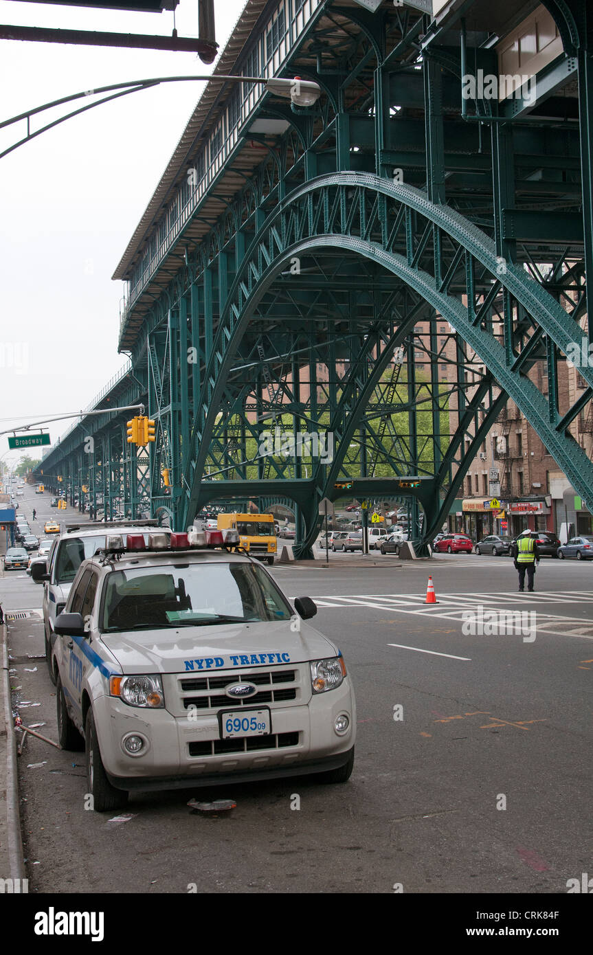 NYPD police car on Broadway close to Morningside overhead railroad New York USA Stock Photo