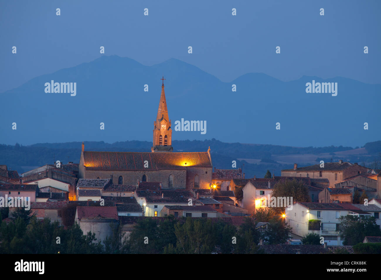 the village of Lasbordes at dawn, with the Pyrenees beyond, Aude, Languedoc-Roussillon, France Stock Photo