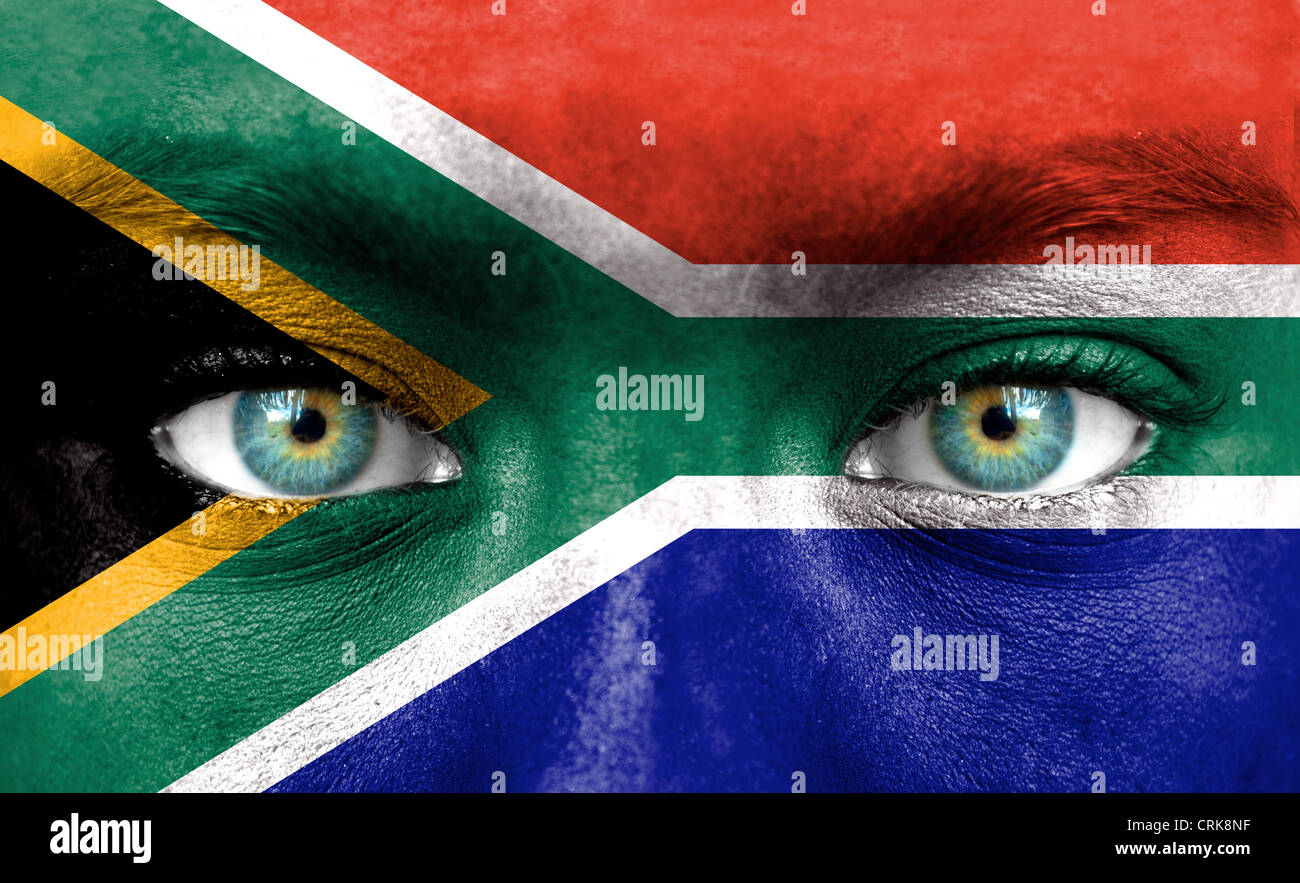Human face painted with flag of South Africa Stock Photo