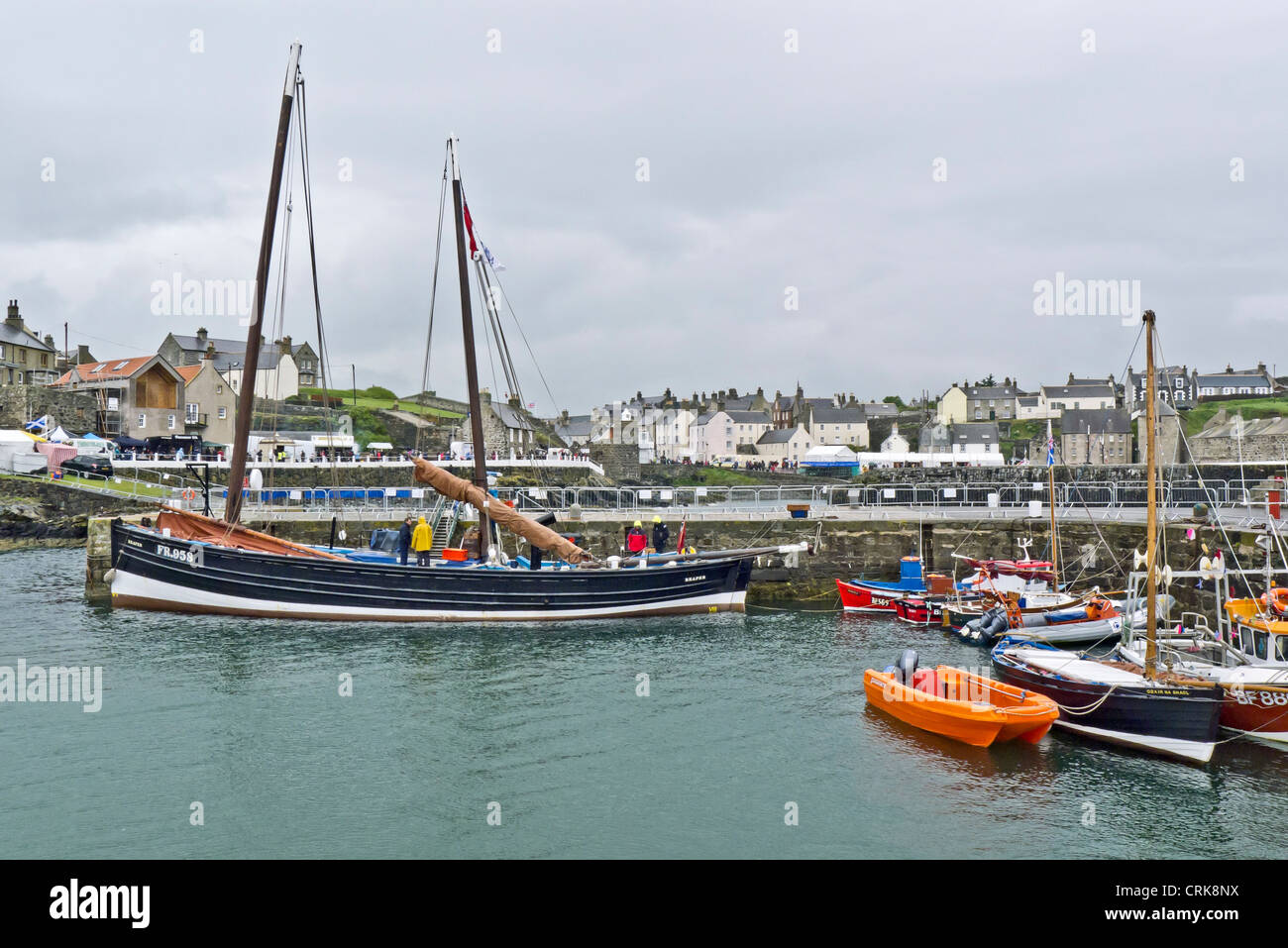 A general view of Portsoy Harbour during the the 19th Scottish Traditional Boat Festival held this year in wet weather Stock Photo