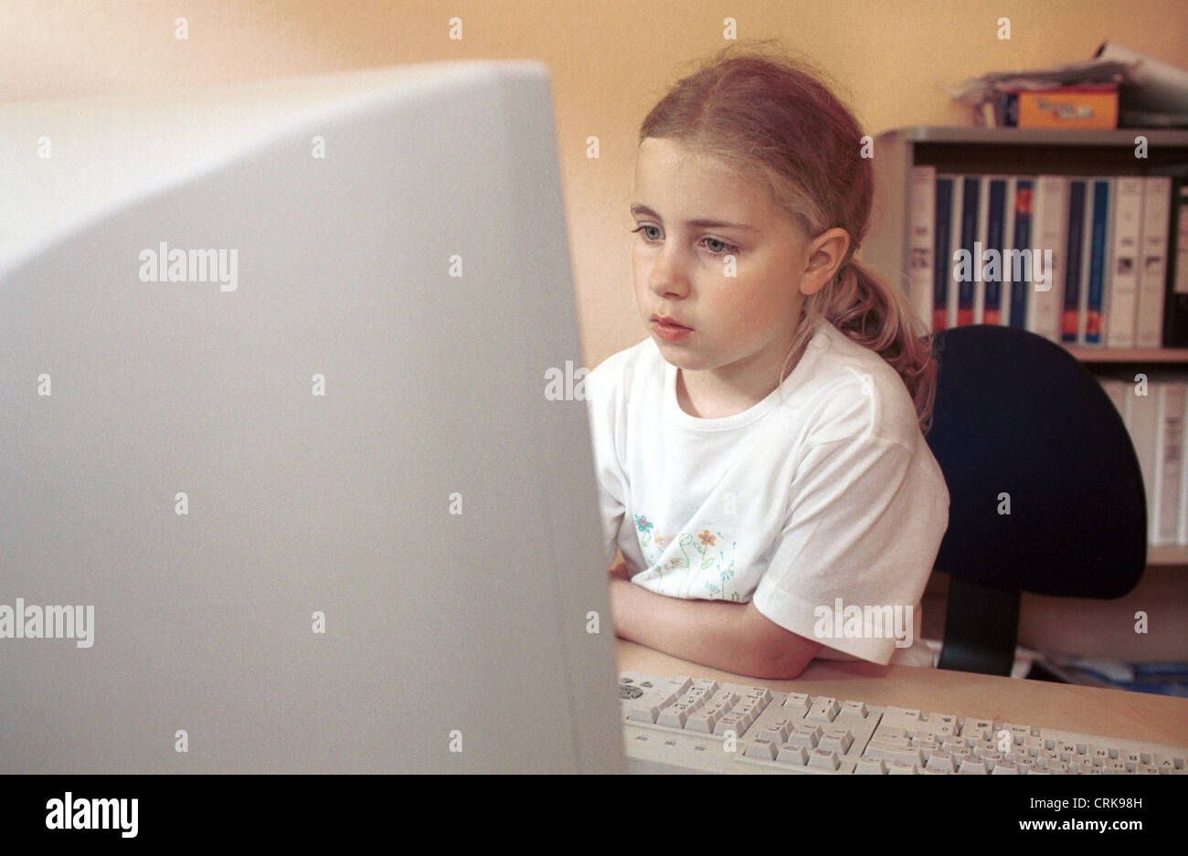 Girl on computer Stock Photo