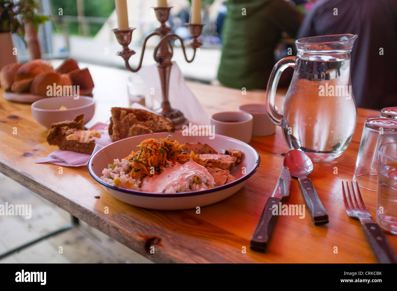 A plate of healthy food on outdoors tables Fforest outdoor adventure centre near Cardigan west Wales UK Stock Photo