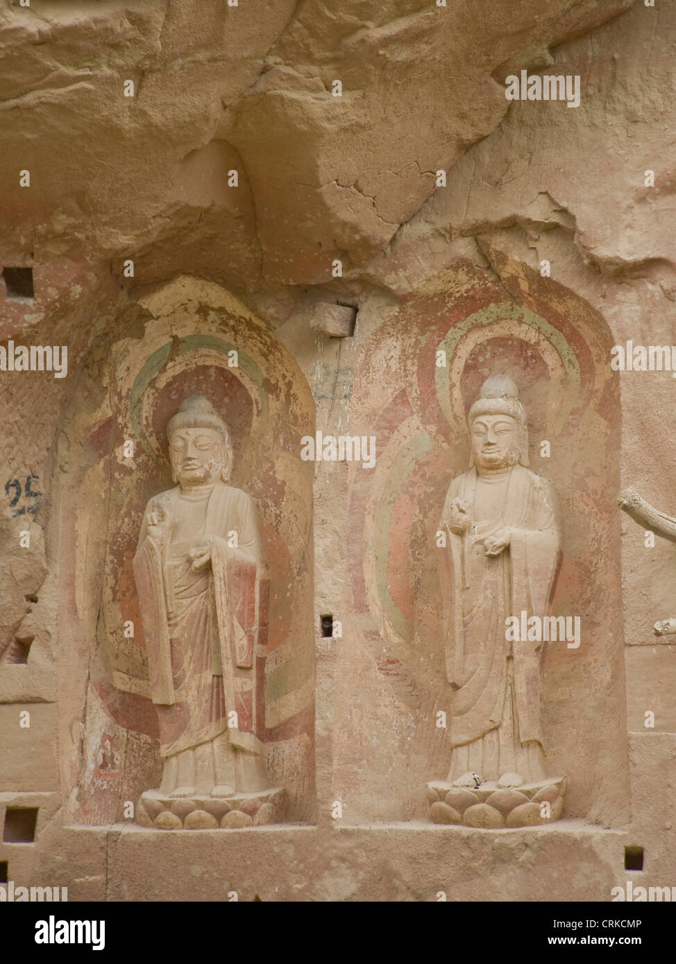 Smaller relief stone carvings at the Bingling grottoes. Stock Photo