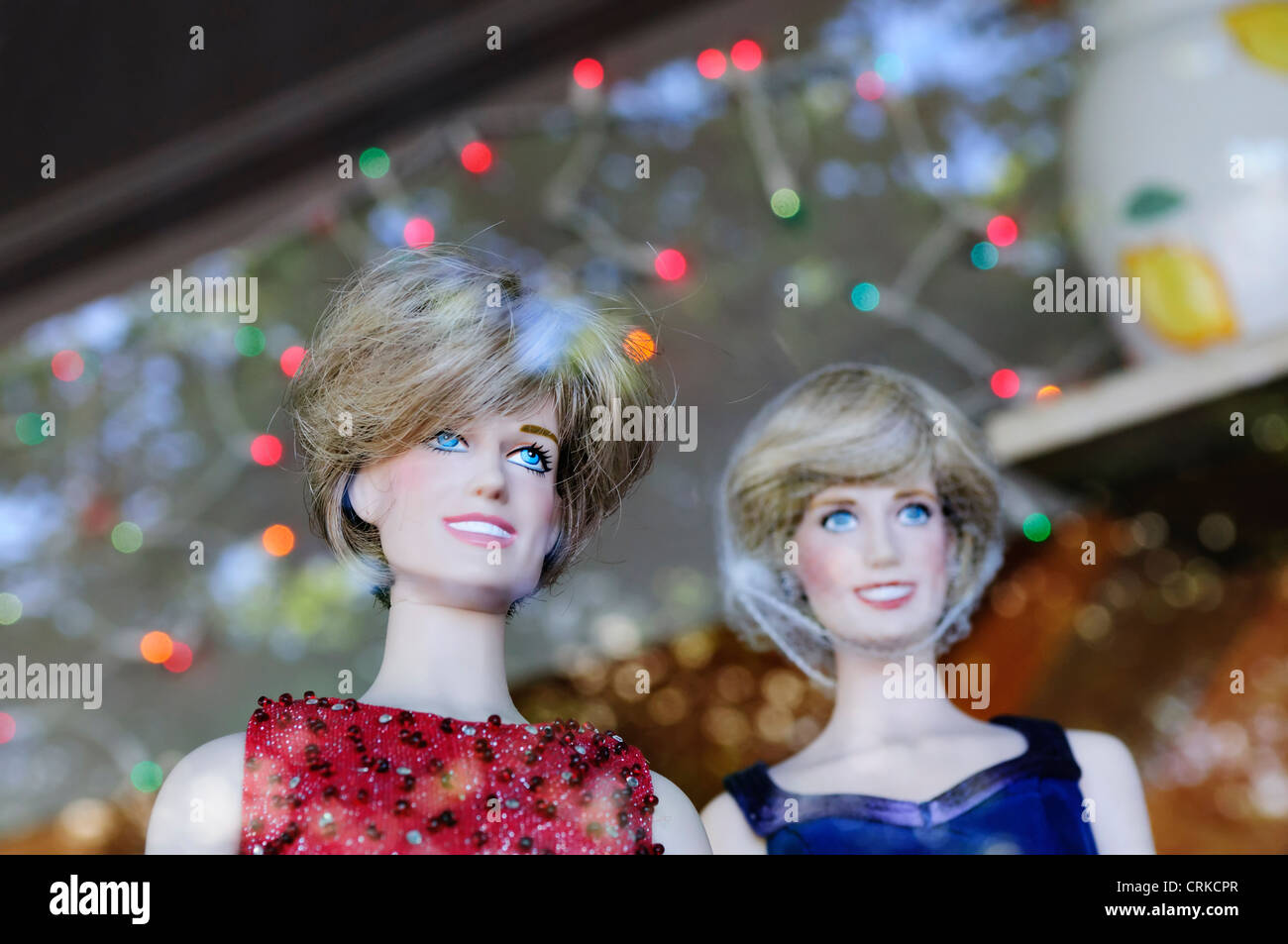 Elegant Princess Diana dolls are featured in this storefront display in downtown Aberdeen, Washington. Stock Photo