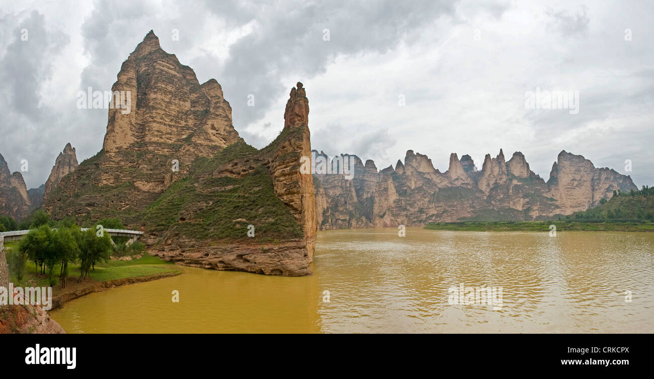 The magnificent rugged scenery where the Bingling Grottoes are located on the Yellow river. Stock Photo