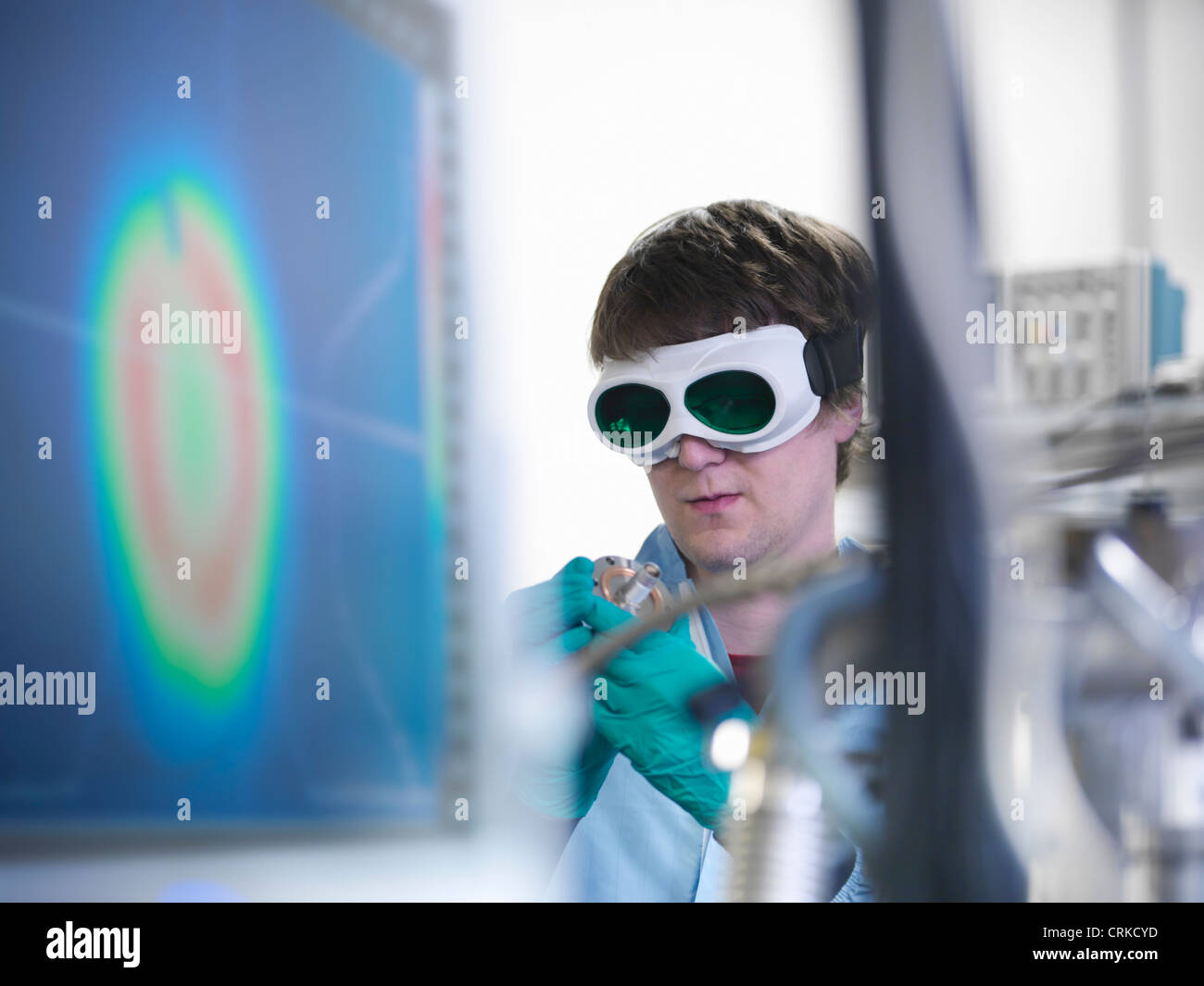 Scientist working with vacuum in lab Stock Photo