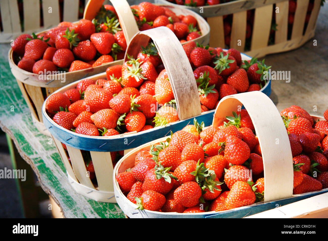 Strawberries in baskets at French market Stock Photo Alamy