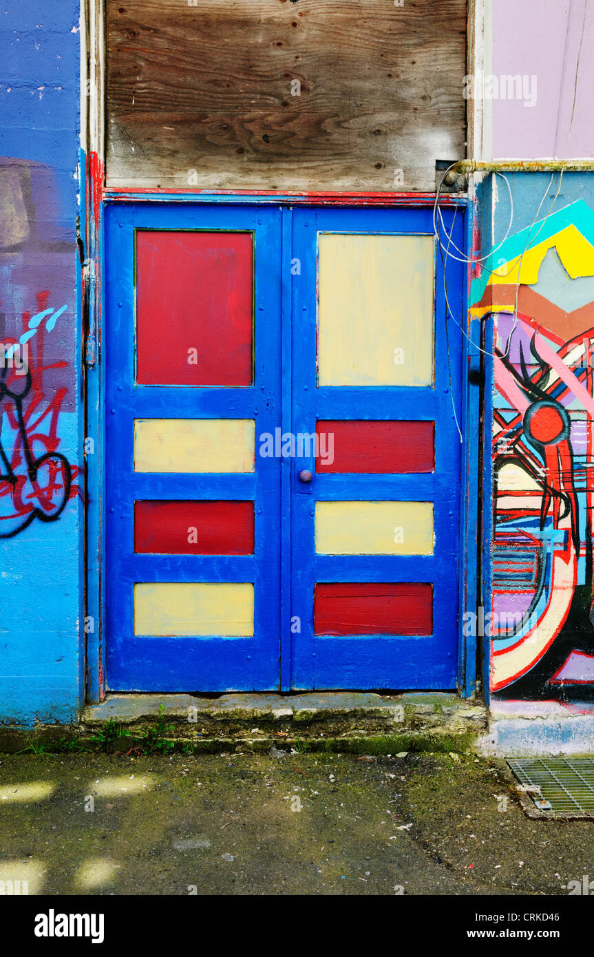 Colorful door in alley filled with graffiti in downtown Aberdeen, Washington. Stock Photo