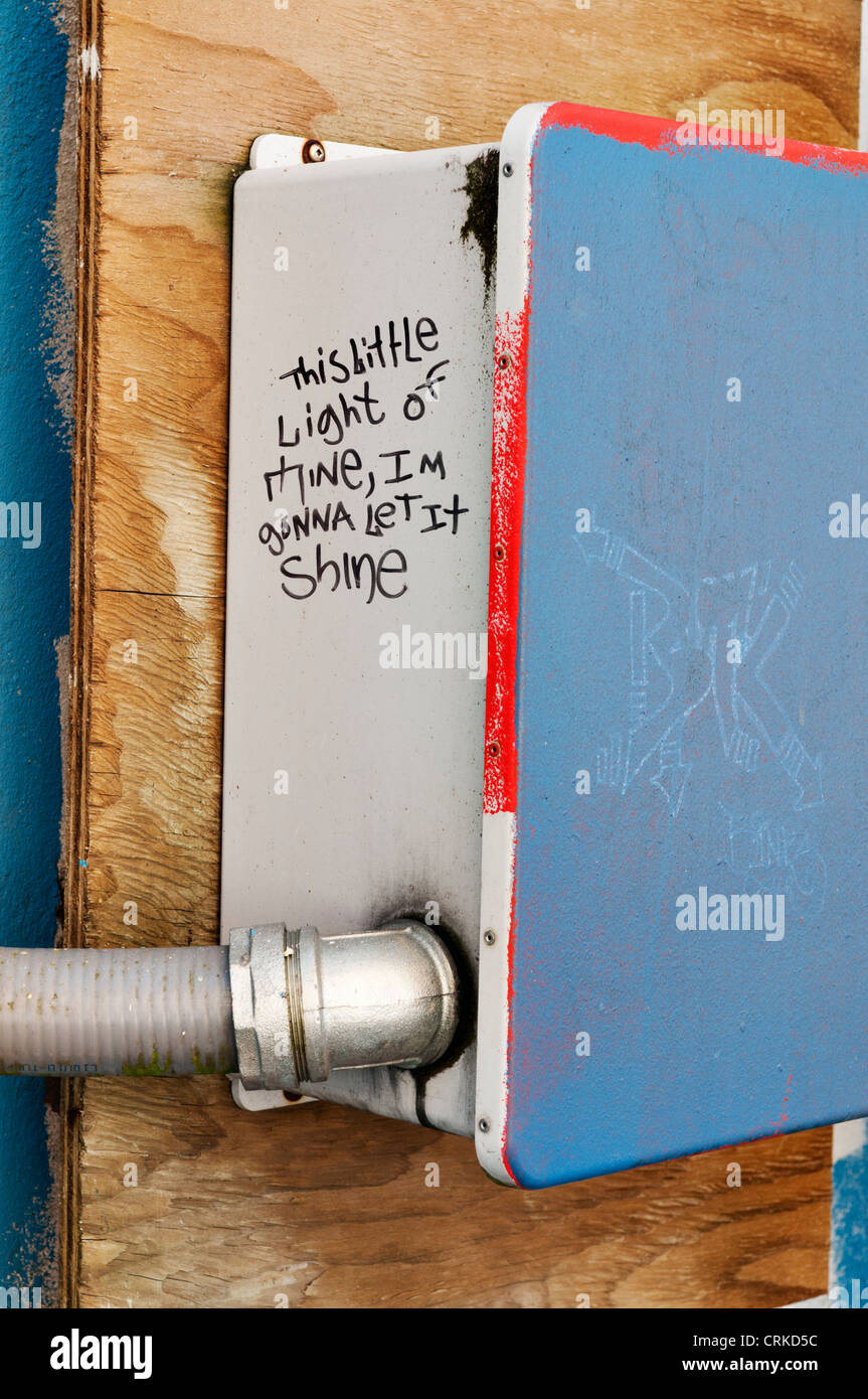Electric box attached to a wall in an alley is painted with graffiti in downtown Aberdeen, Washington. Stock Photo
