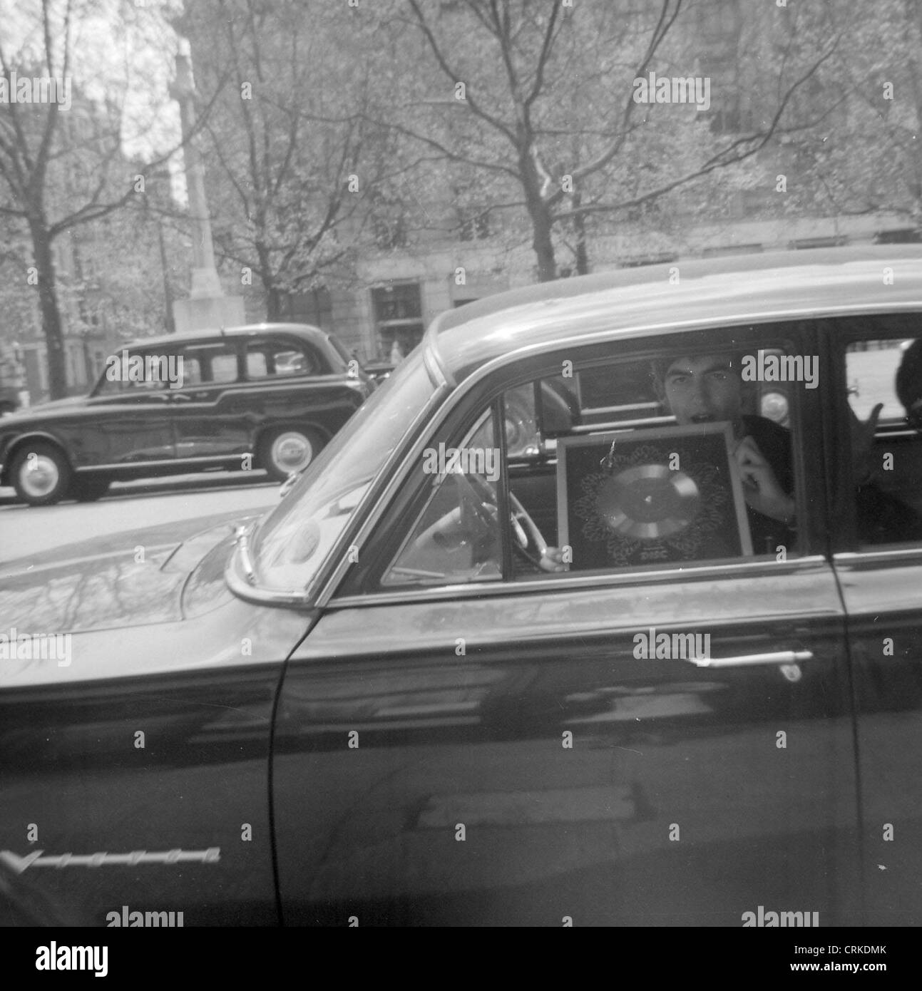 003138 - George Harrison in Sloane Square, Chelsea, London on 10th February 1963 Stock Photo