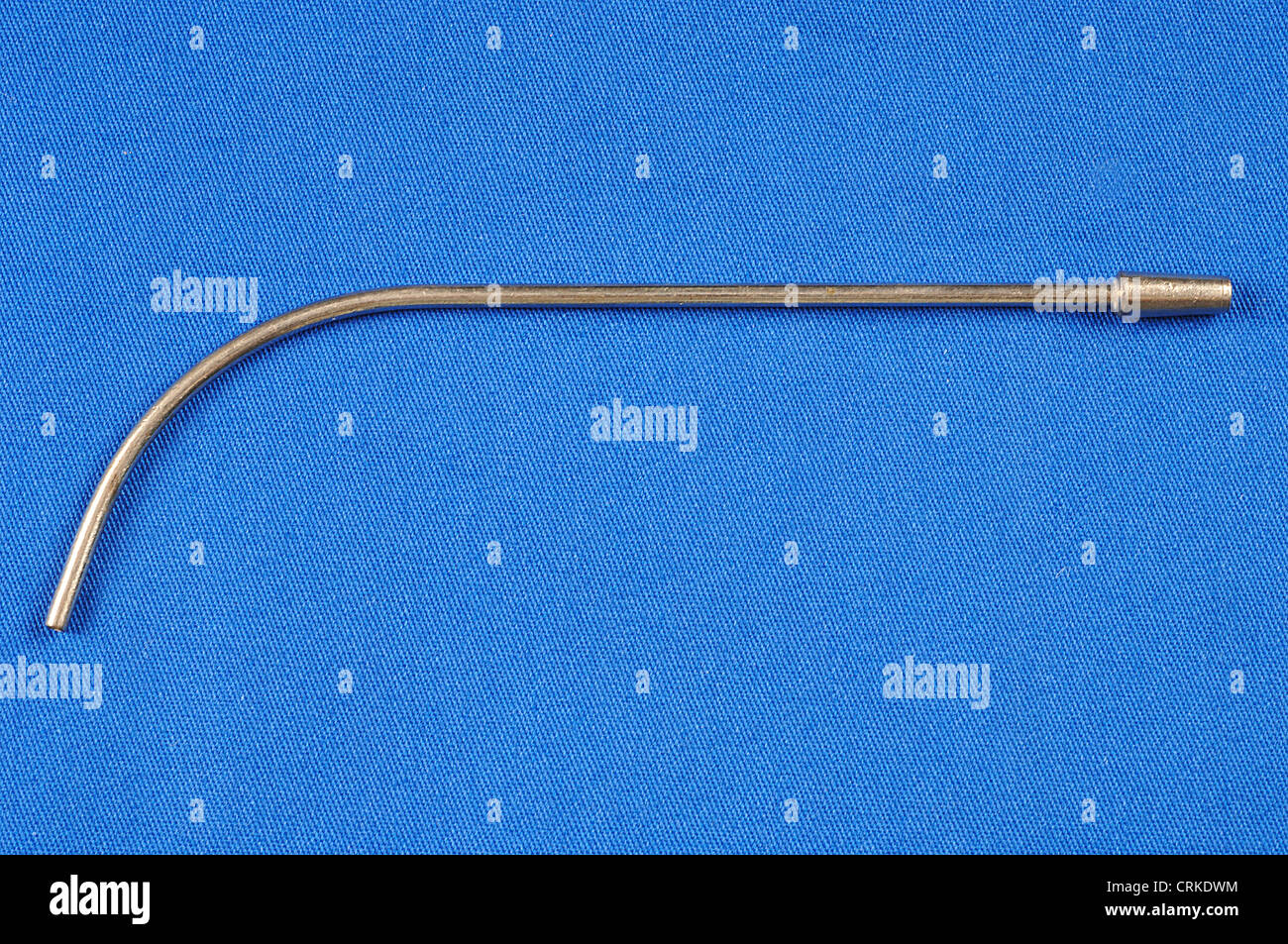 A standard suction tip. This is used to remove fluid from small cavities during surgery. Stock Photo