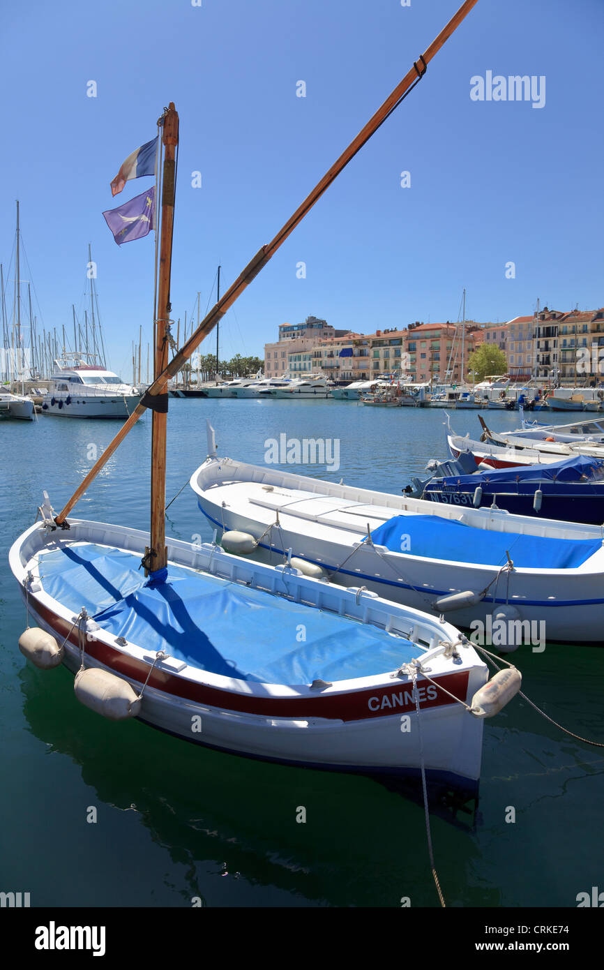 Fishing boats tied up at Cannes harbour, Cote d'Azur, France Stock