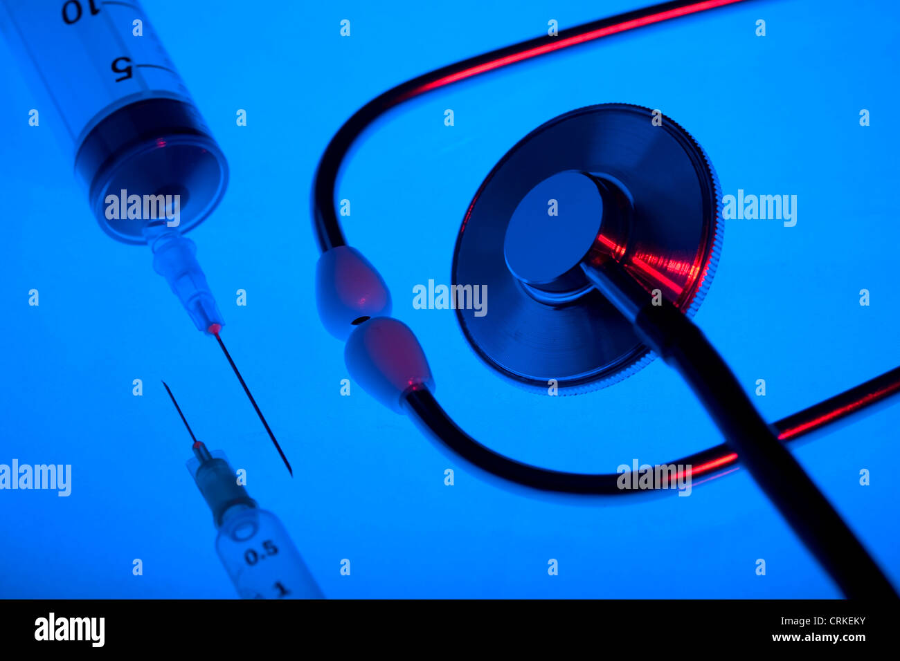 stethoscope with two syringes Stock Photo