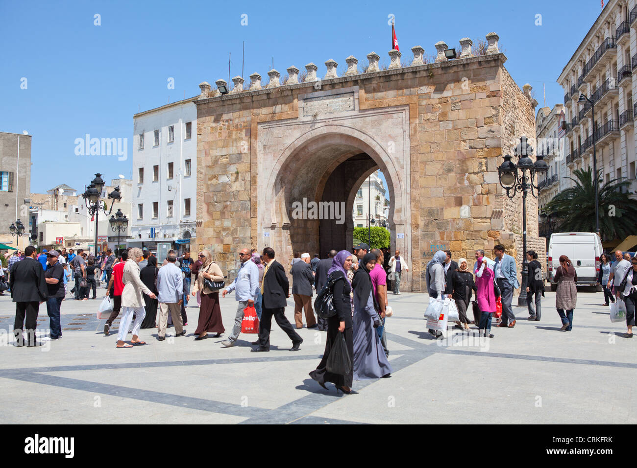 Square and Bab Bhar, Porte de France in the central part of the Tunis.  People on cross of Place de la Victoire by the Medina Stock Photo - Alamy