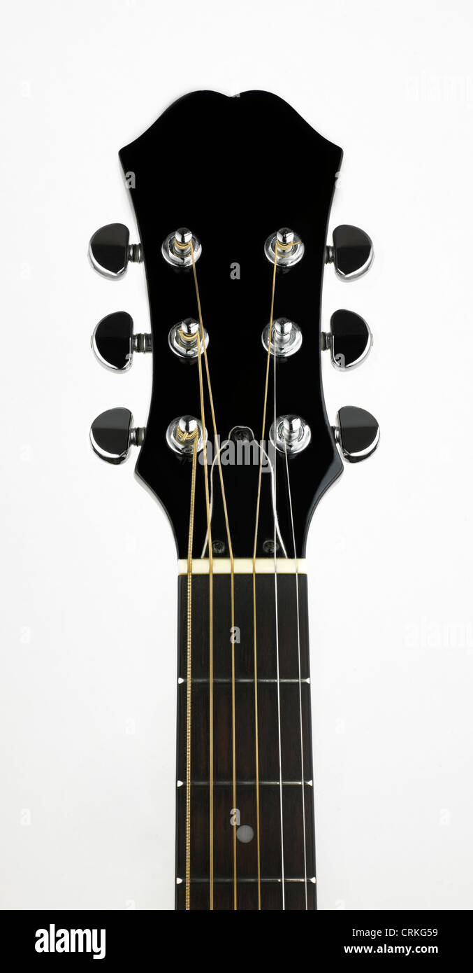 An acoustic guitars headstock including tuning pegs Stock Photo Alamy