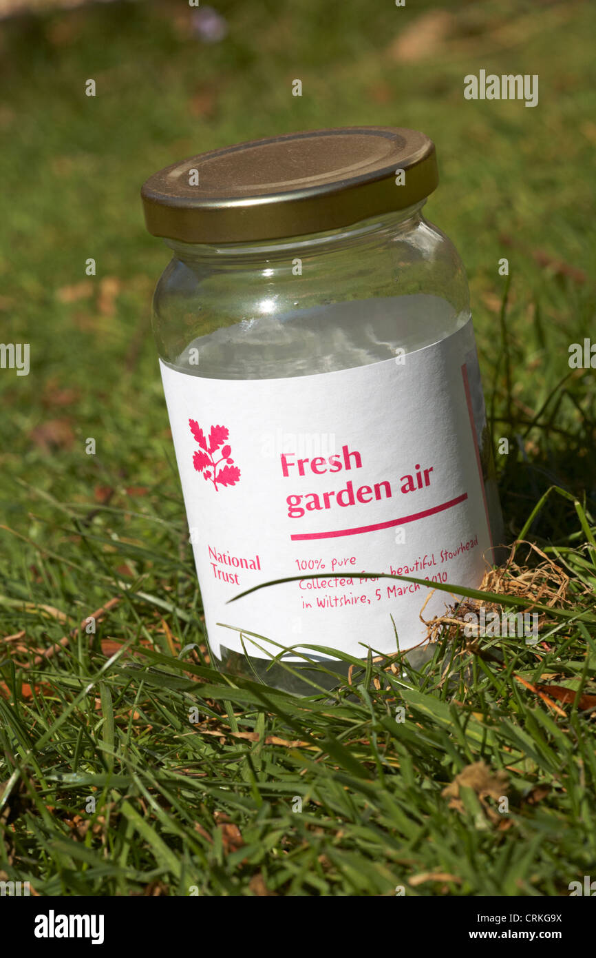 jar of National Trust fresh garden air placed on grass - 100% pure Stock Photo