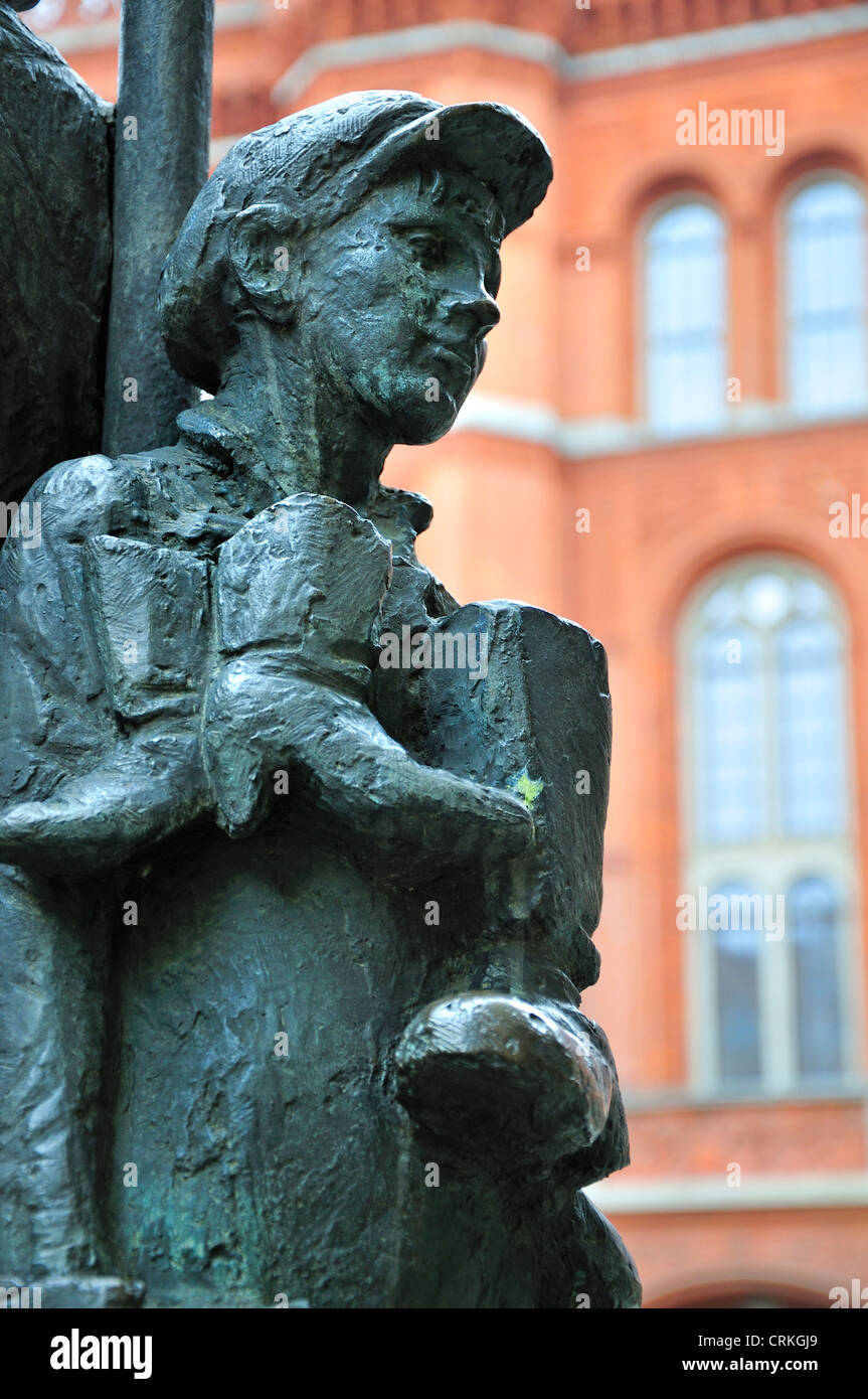 Berlin, Germany. Am Nussbaum (street) Bronze sculpture of man, woman ...