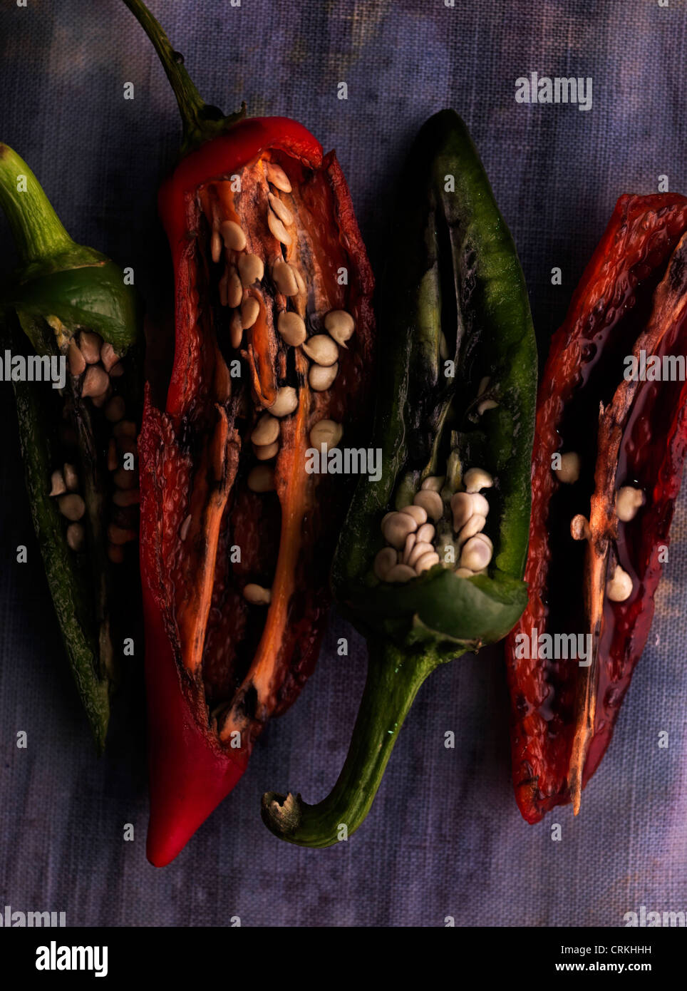 red and green sliced chilli peppers Stock Photo
