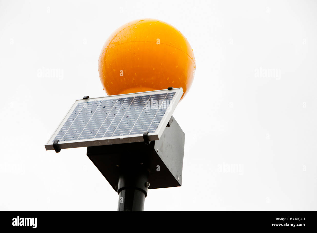 A solar powered beacon light at a Zebra crossing Kings Cross