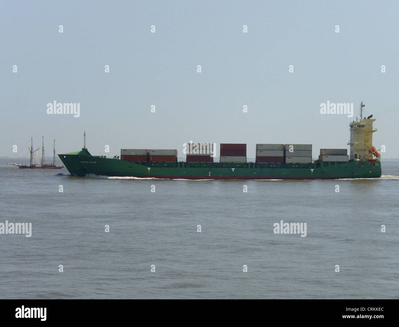 The feeder ship '''Nordic Philip''' outbound on the Elbe river Stock Photo
