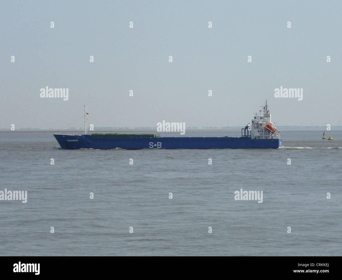The general cargo ship '''Emswave''' outbound om the Elbe river Stock Photo