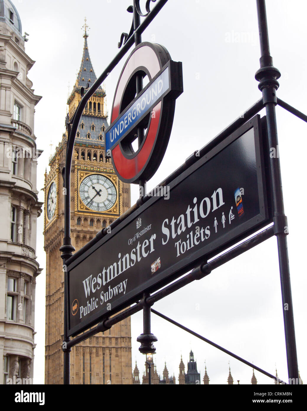 Westminster station sign and the Queen Elizabeth tower, houses of Parliment Stock Photo