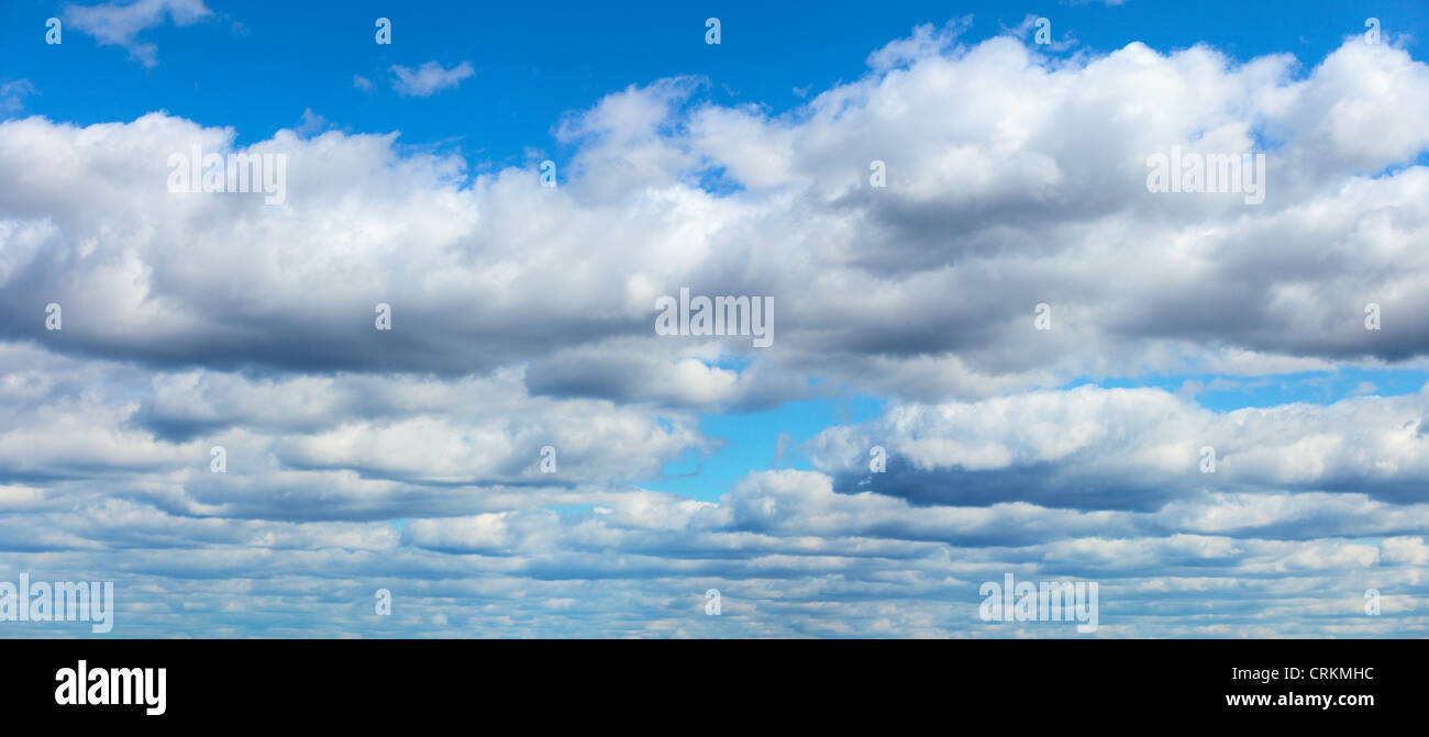 Blue sky with clouds - panoramic background Stock Photo - Alamy