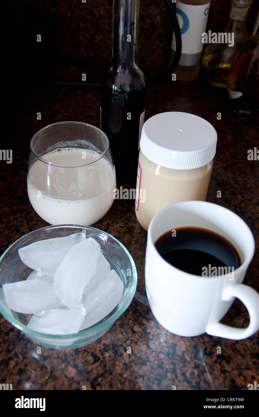 Iced coffee ingredients ice, coffee, cream, honey Stock Photo Alamy