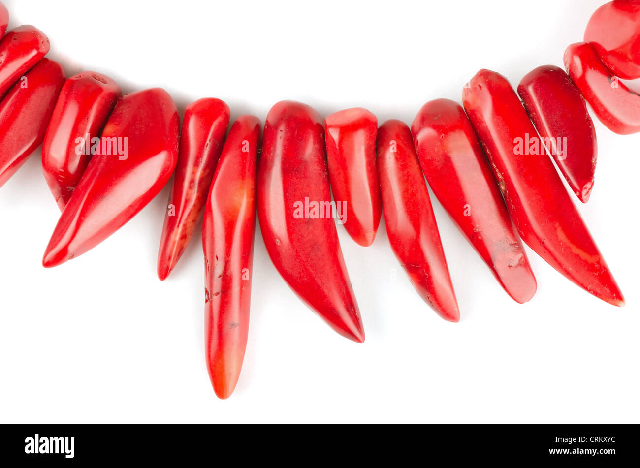 Red natural coral necklace on white background Stock Photo