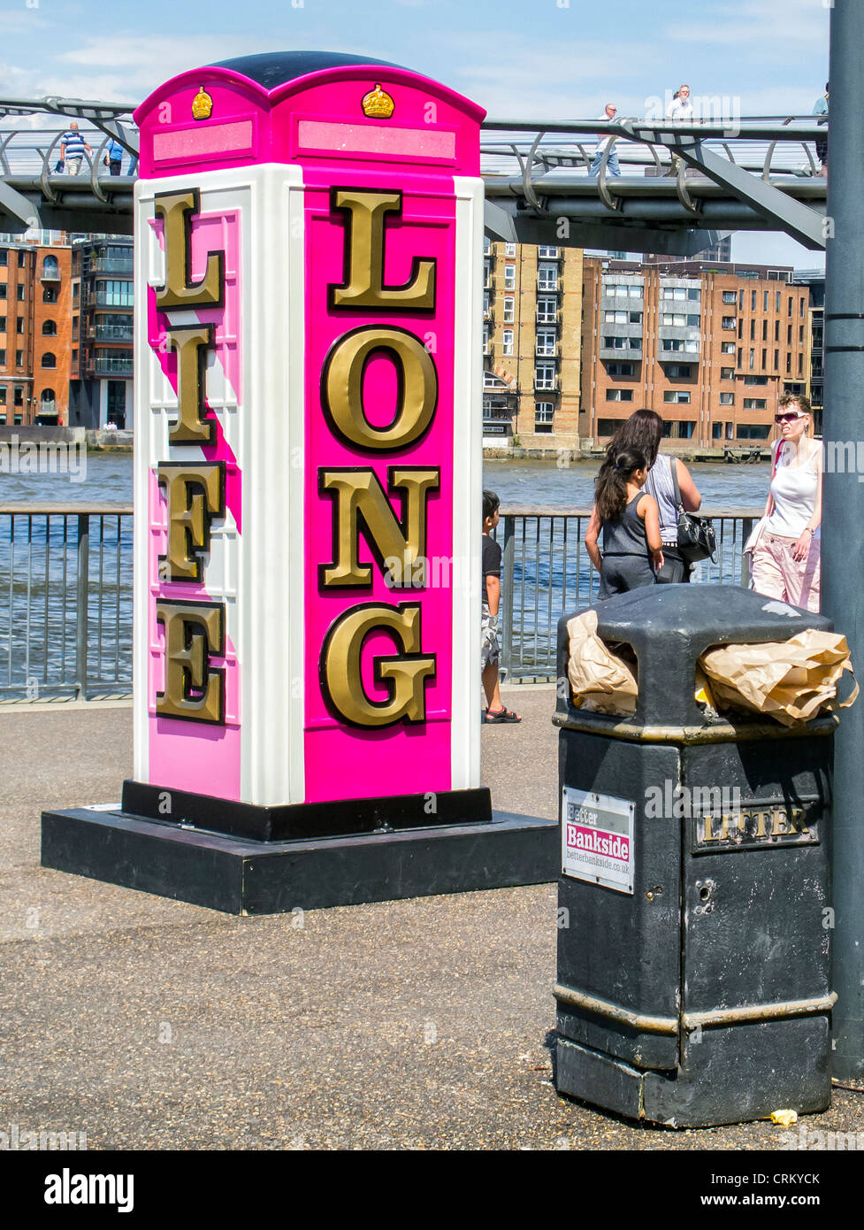 LONG LIVE LOVE LIFE by Ryan Callanan  - Decorated fibreglass replica of the K6 telephone kiosk near the Tate Modern Gallery, London,UK Stock Photo