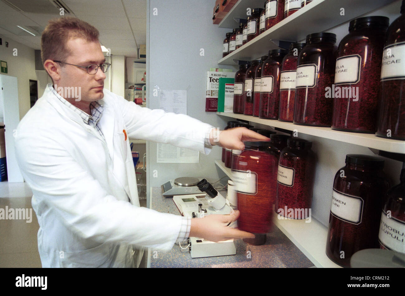 Pharmacists manufactures medicinal tea Stock Photo