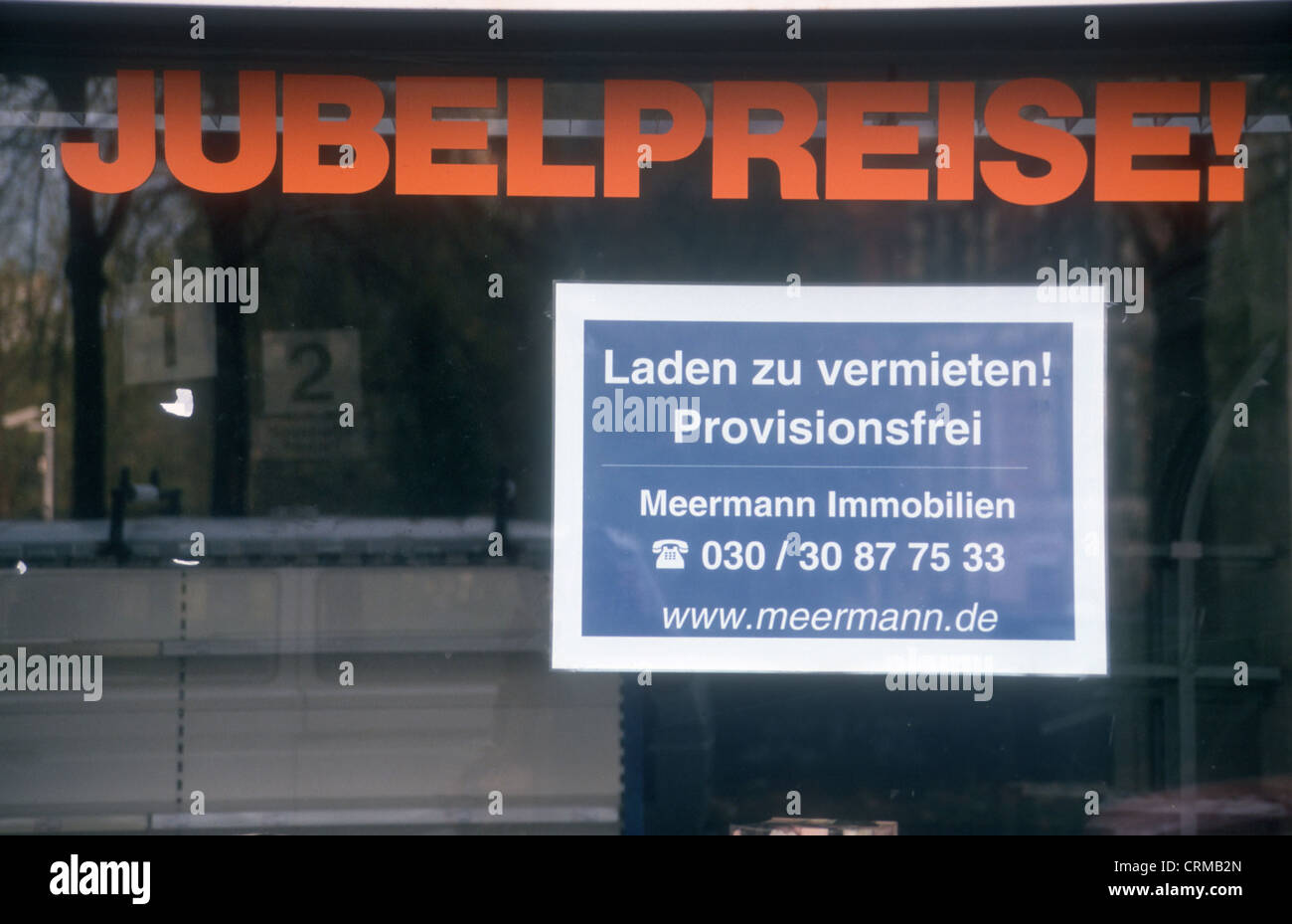 Inscriptions jubilation prices and shop for rent-to showcase Berlin Stock Photo