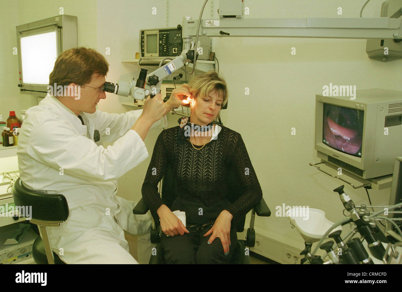 ENT doctor examines patient, Berlin Stock Photo