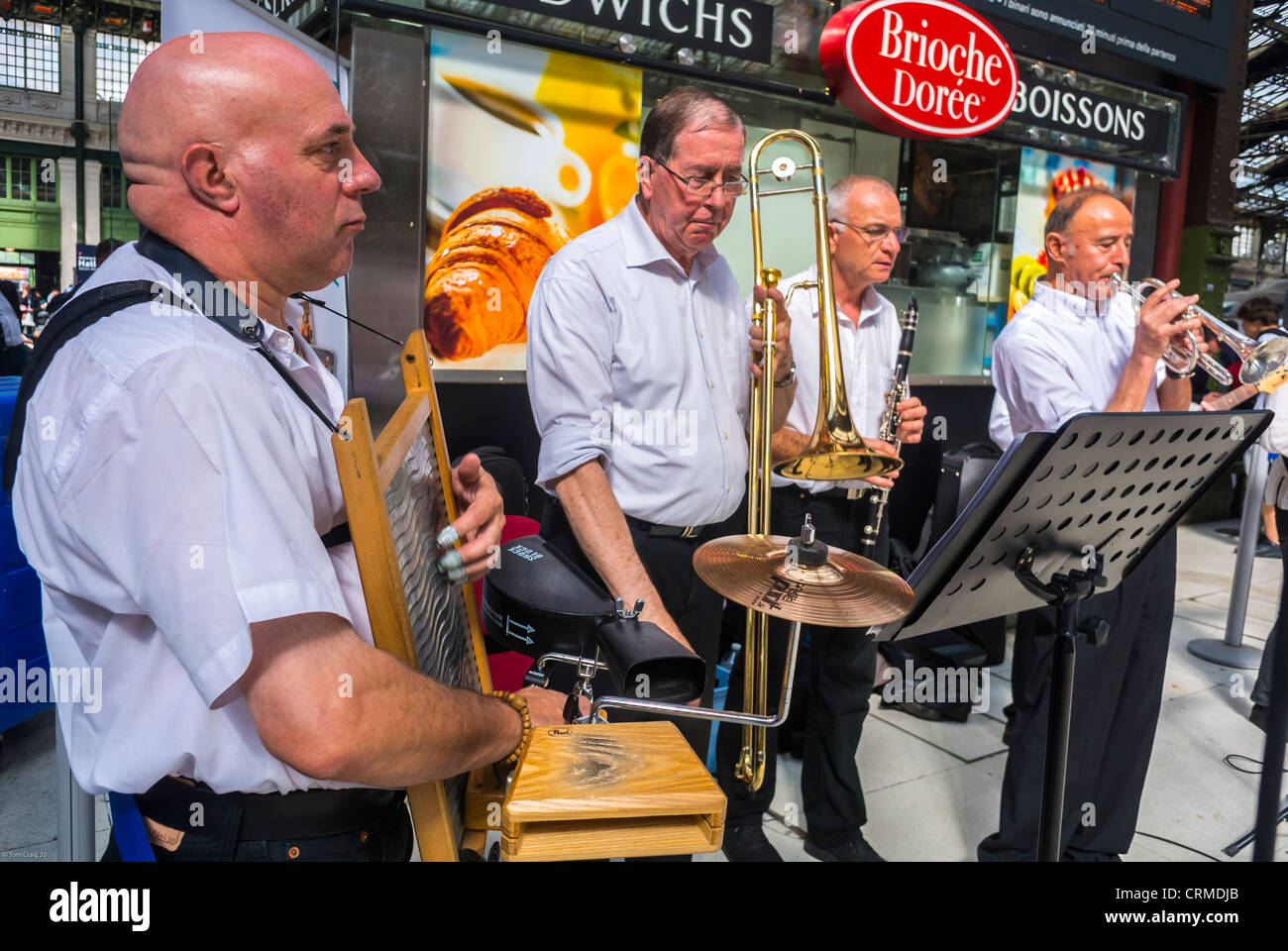 Paris, France, New Orleans Jazz Band, Orchestra Performing, Train Station, National Music Day, 'Fete de la Musique', American Jazz Music Concert, Musicians make music together, seniors grown up, Spring Jazz Band Stock Photo
