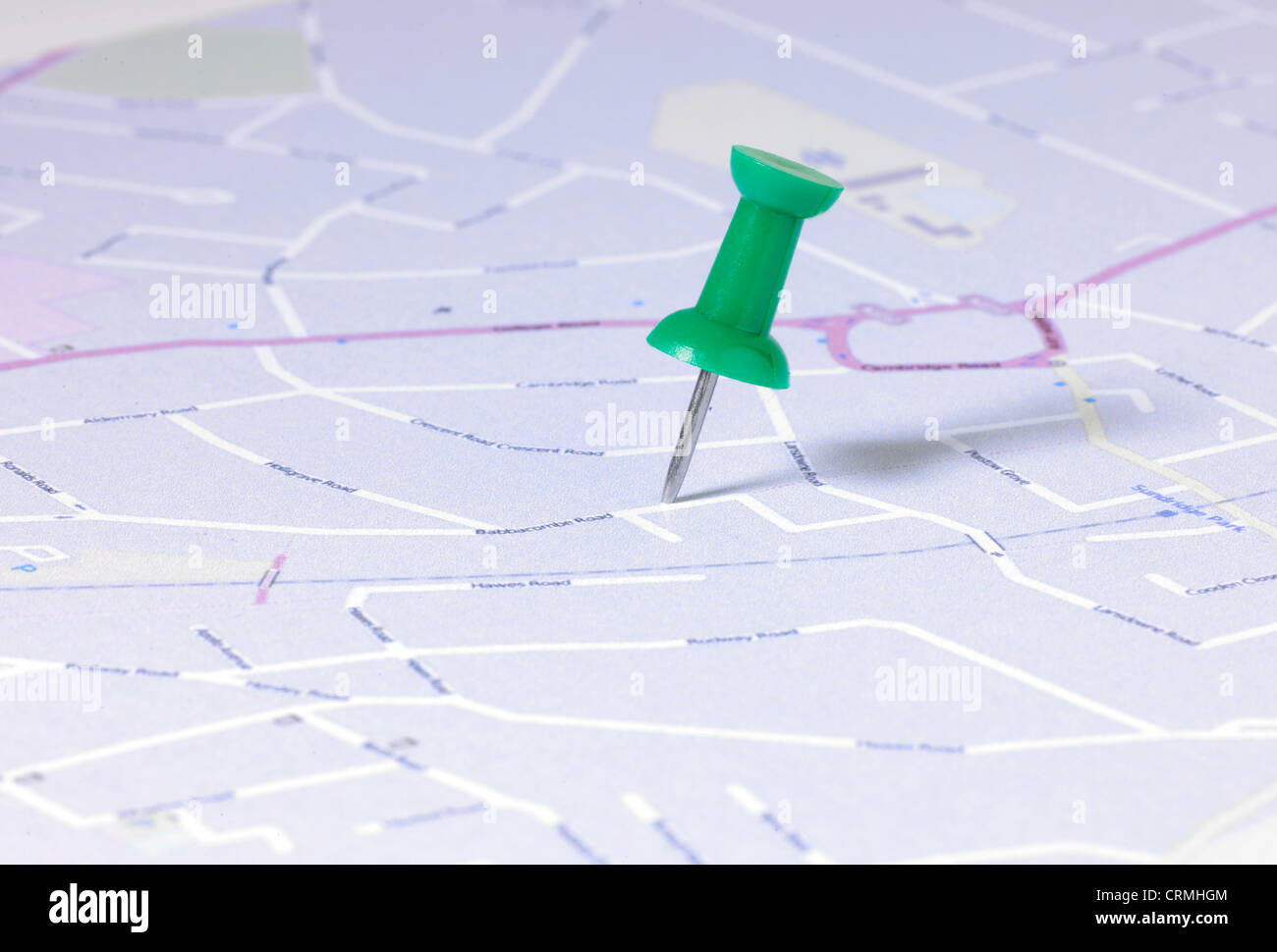 detail of a green map pin in English street map Stock Photo