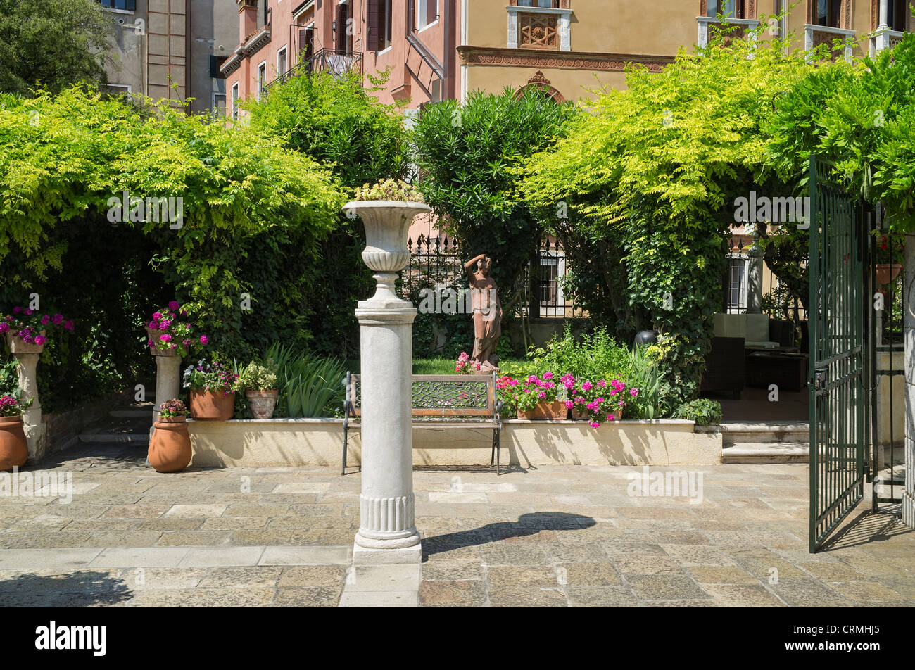 Italian courtyard garden in Venice Stock Photo