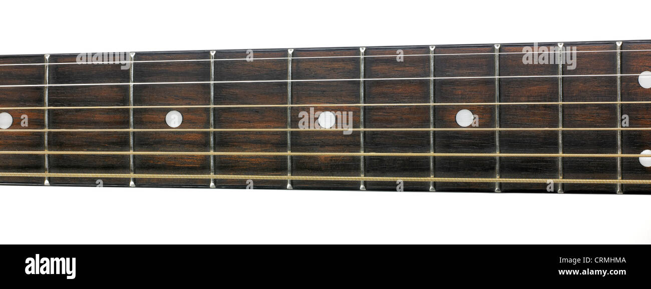 Guitar dark wood fret board and strings Stock Photo