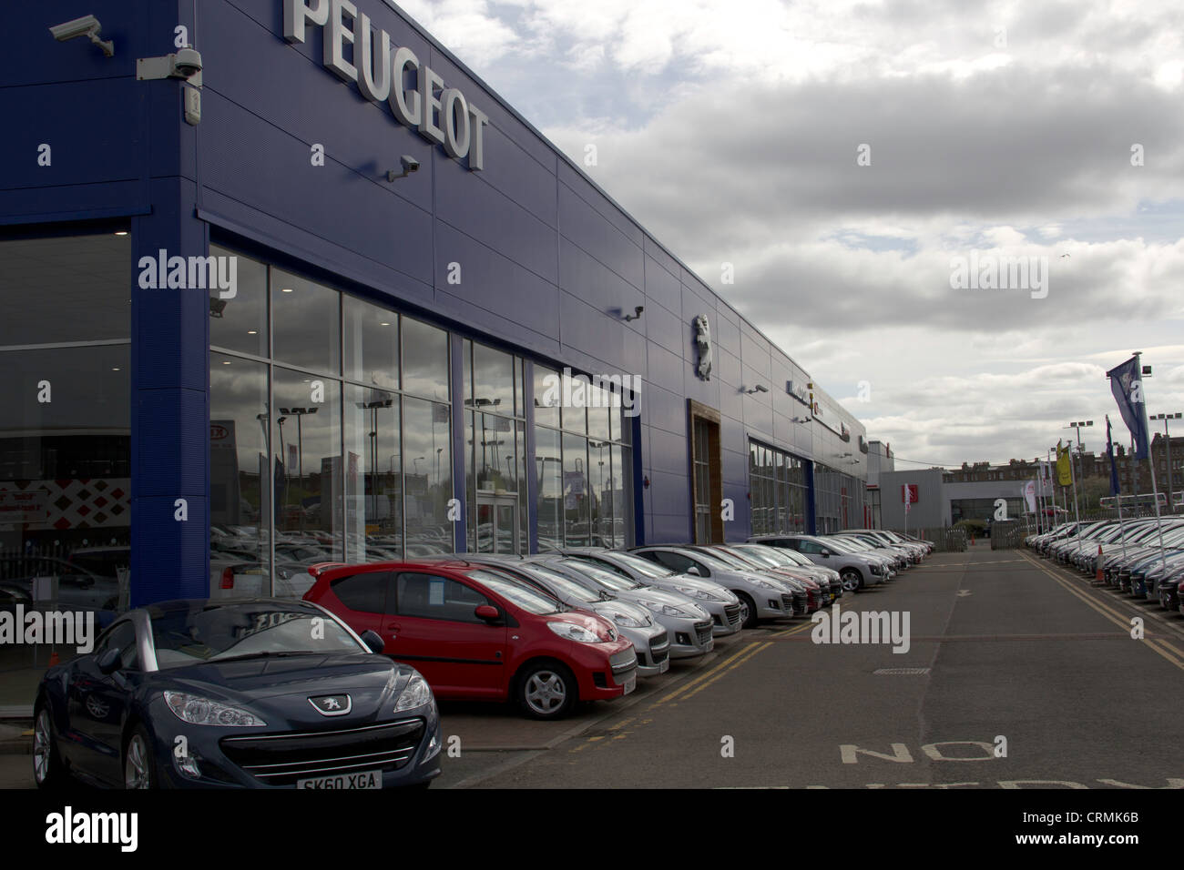 Cars available for rent and for purchase at the Arnold Peugeot dealership outside Edinburgh