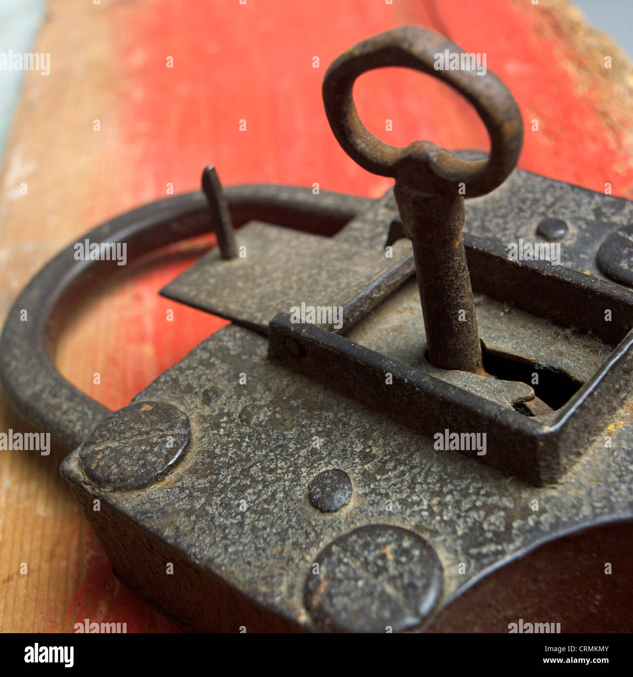 Old key and padlock. Stock Photo