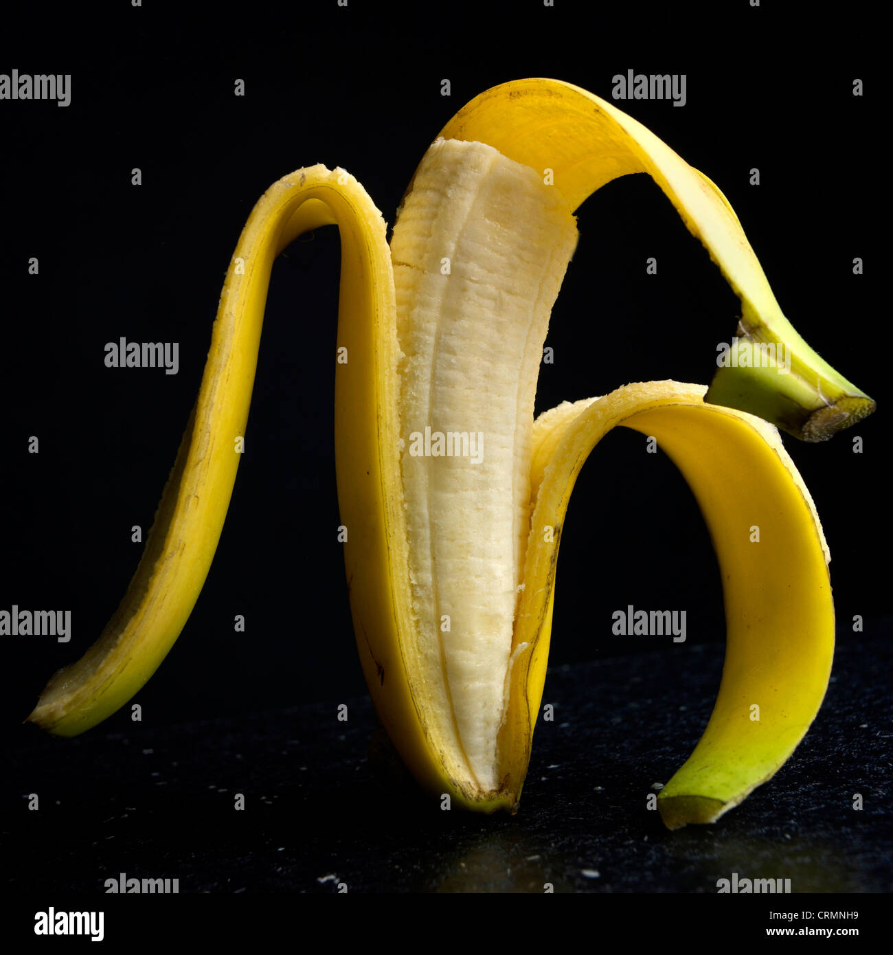 Peeled banana Stock Photo