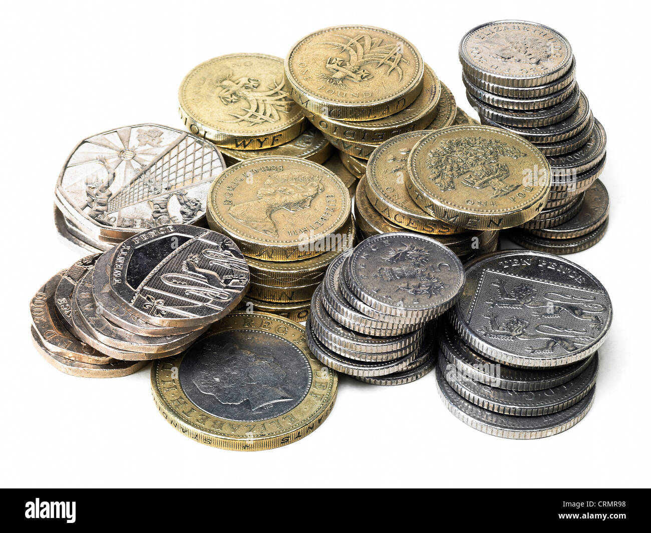Piles of British coins, pounds and silver Stock Photo