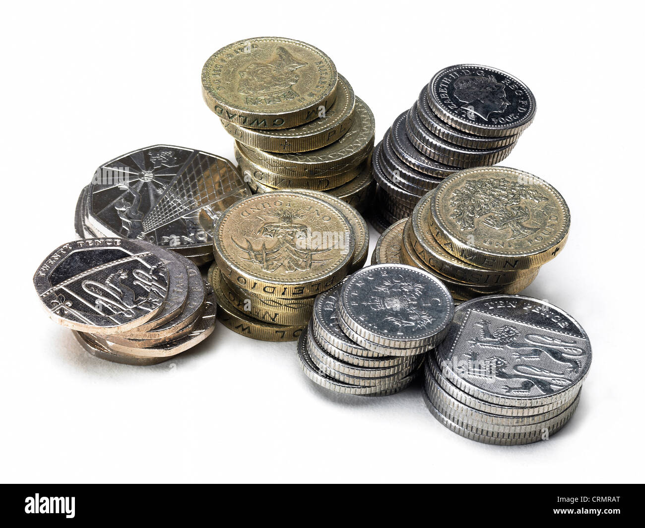 Piles of British coins, pounds and silver Stock Photo