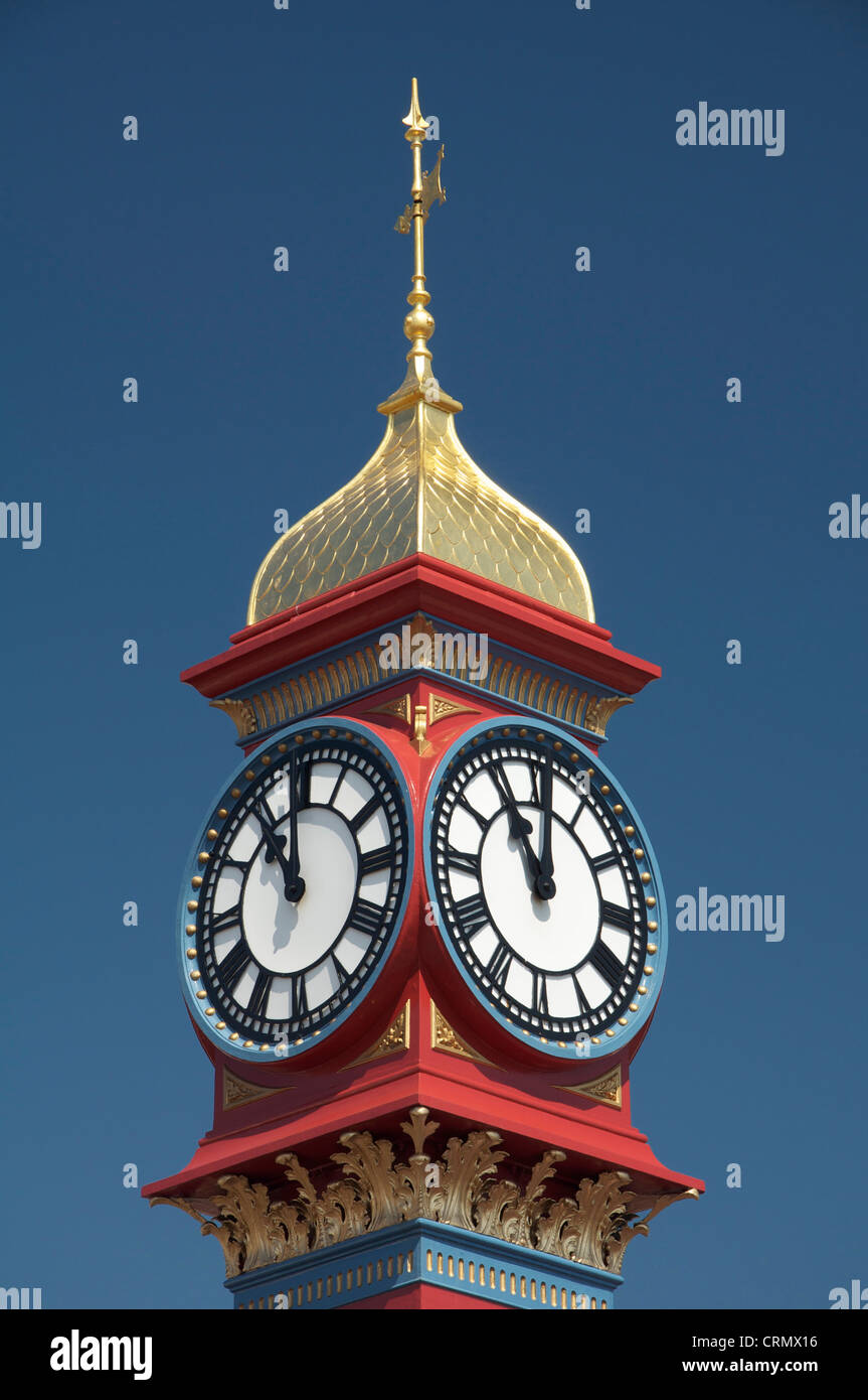 The freshly painted victorian Jubilee clock tower on Weymouth seafront was erected in 1887 to mark fifty years of Queen Victoria’s reign. Dorset, UK. Stock Photo