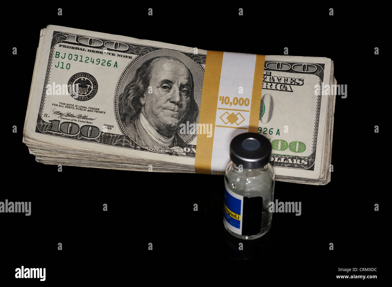 dollar bills and medications Stock Photo