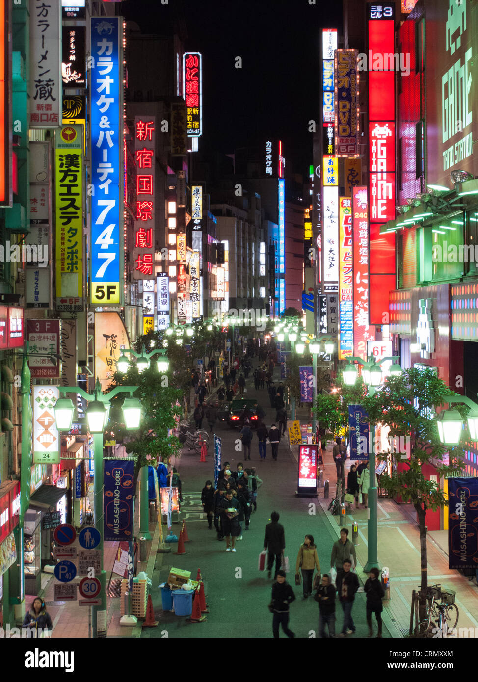 Night scene of neon covered buildings in the Shinjuku district of Tokyo, Japan Stock Photo