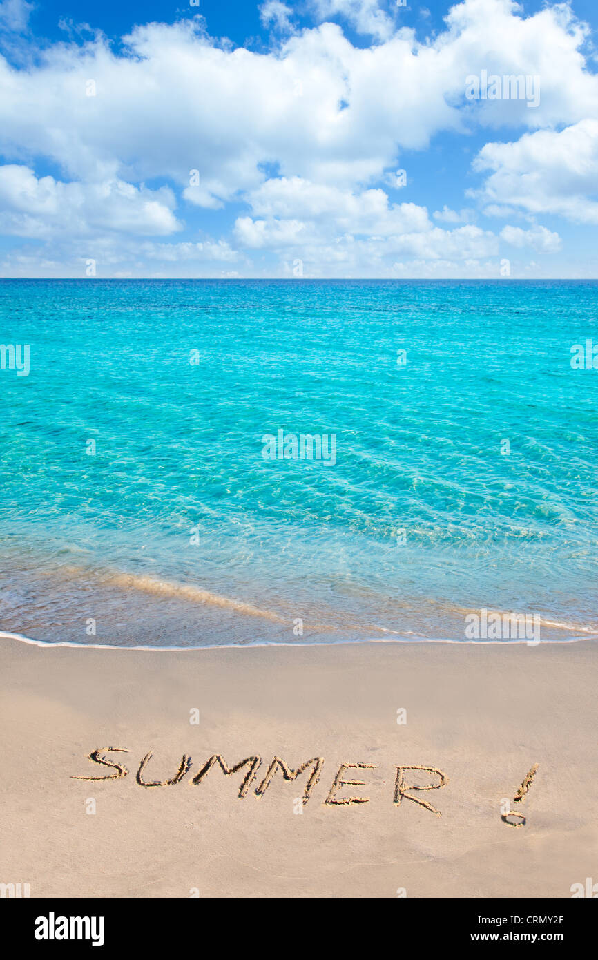 Caribbean tropical beach with Summer word written in sand Stock Photo