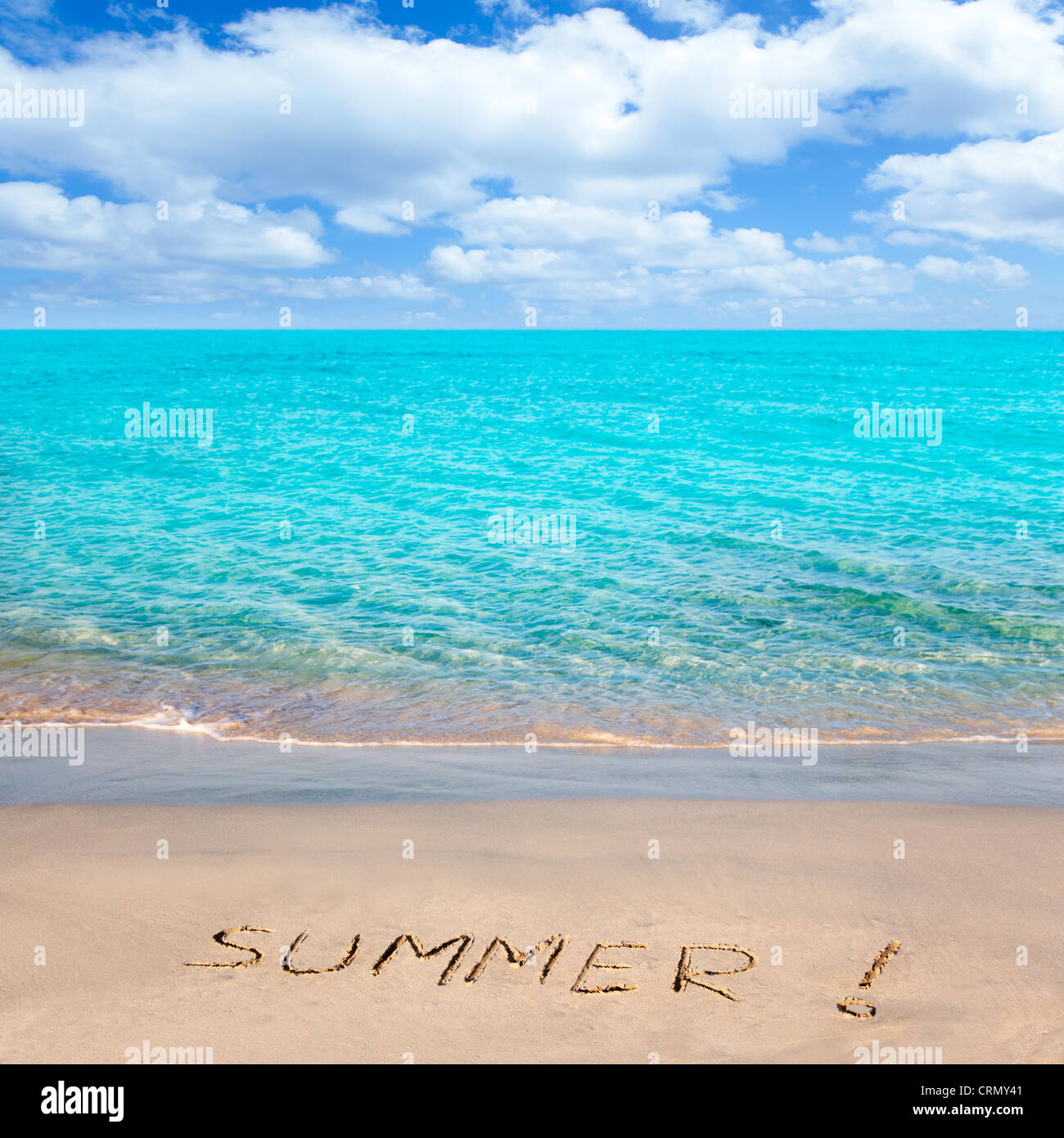 Caribbean tropical beach with Summer word written in sand Stock Photo