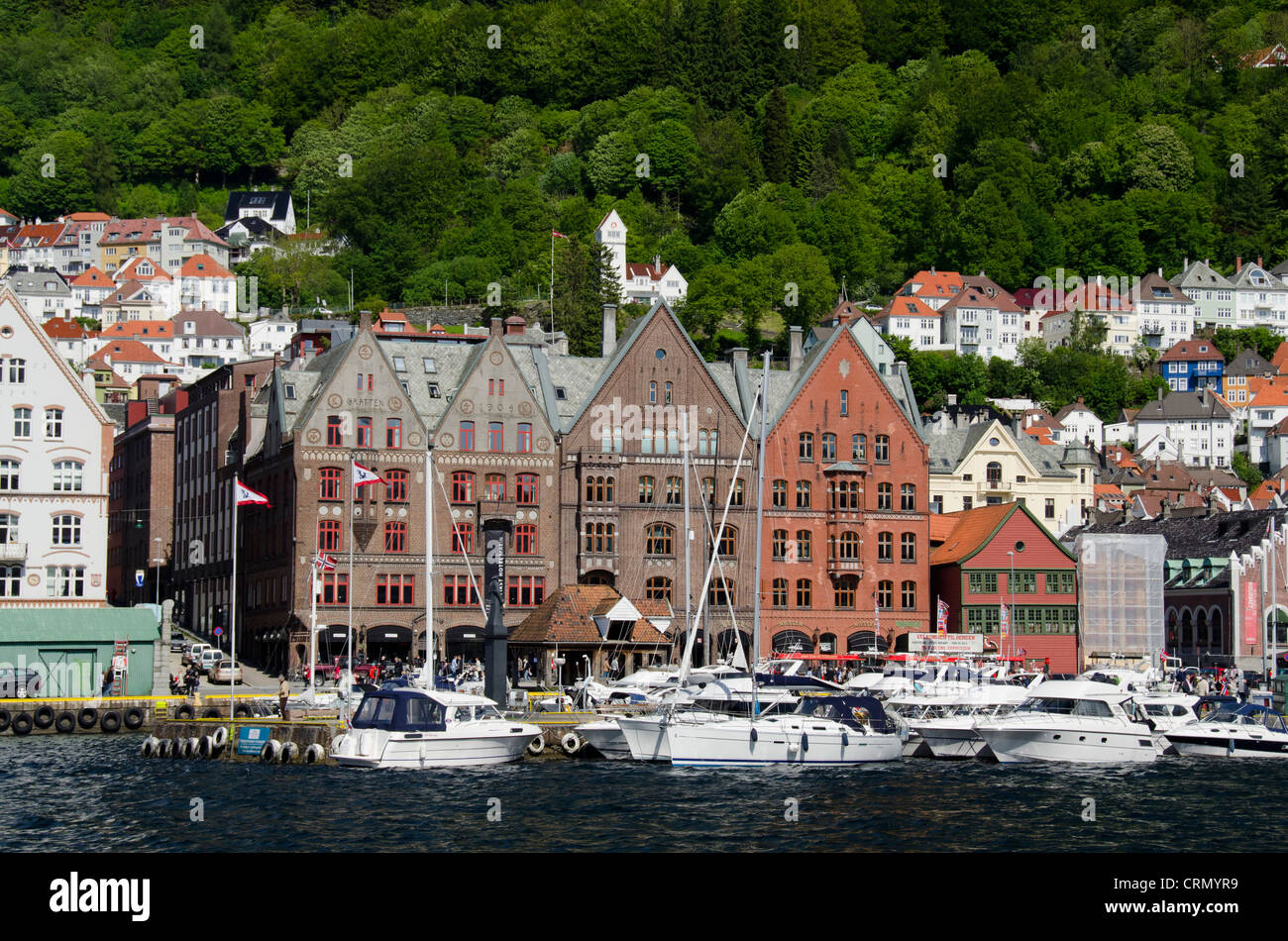 Norway, Bergen. Downtown old Hanseatic historic area of Bryggen, UNESCO World Heritage Site. Wooden buildings along harbor. Stock Photo