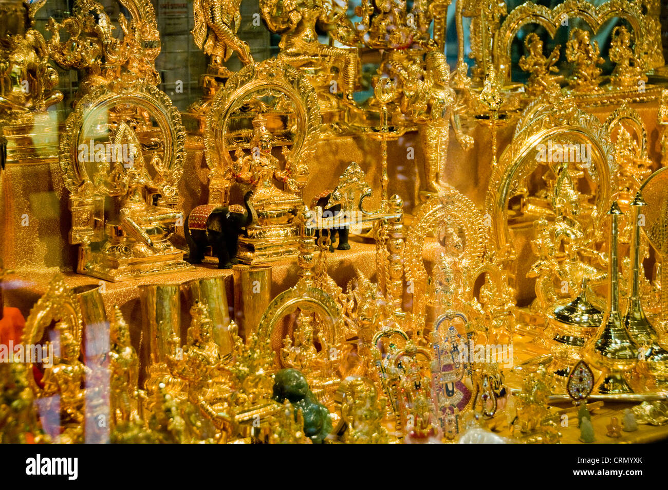 Miniature gold Buddha statues Stock Photo Alamy